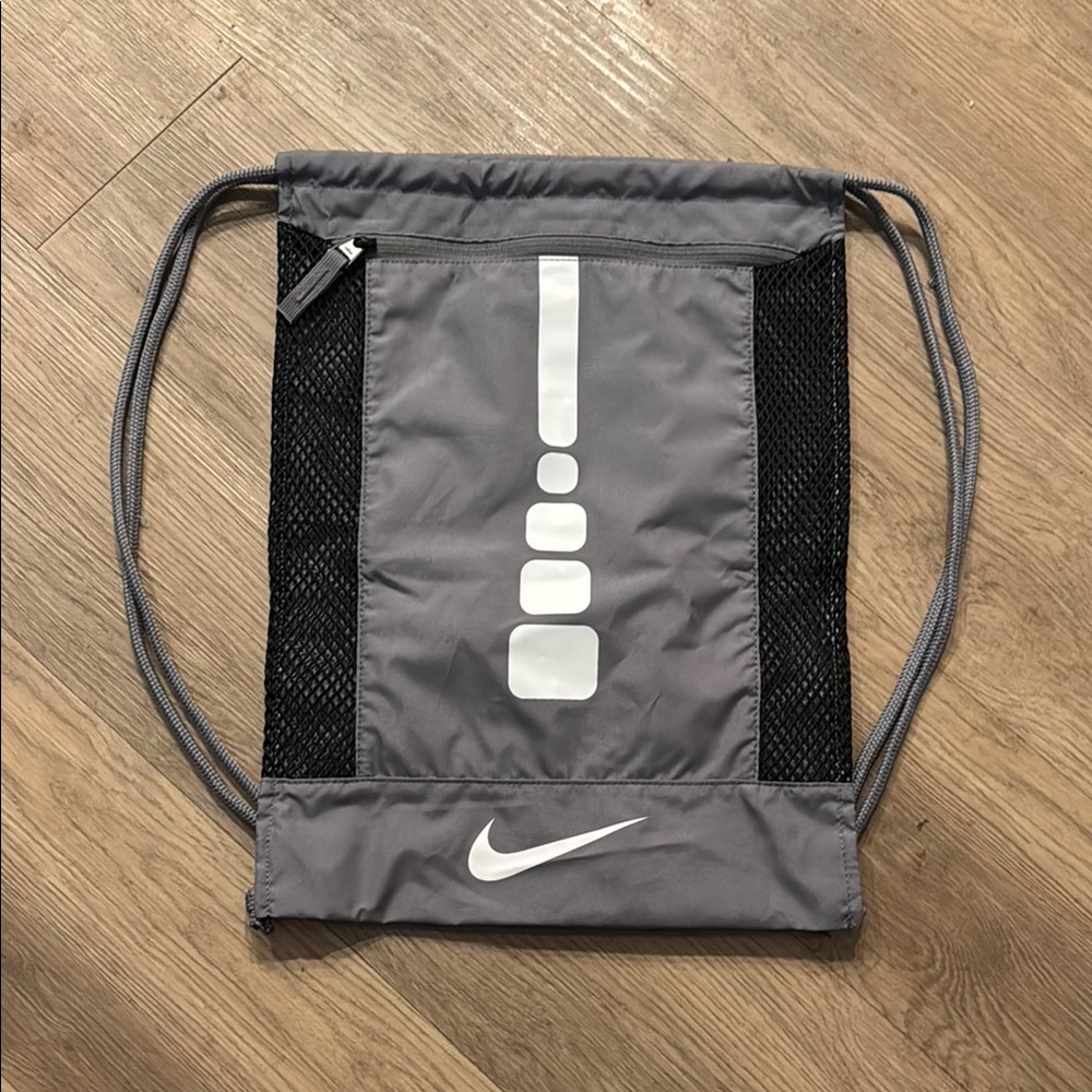Nike Gray Backpack with Iconic Swoosh Design